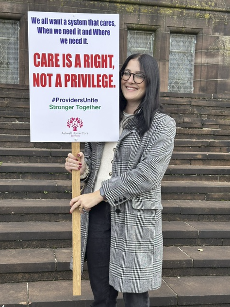 AshwellCare at a social care march with signs