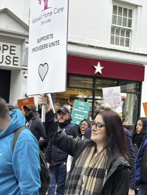 AshwellCare at a social care march with signs